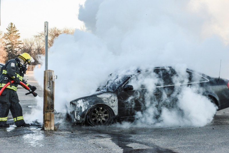 A car in Q Lot caugt fire on the morning of Nov. 12, 2013//Photo Mike Latschislaw