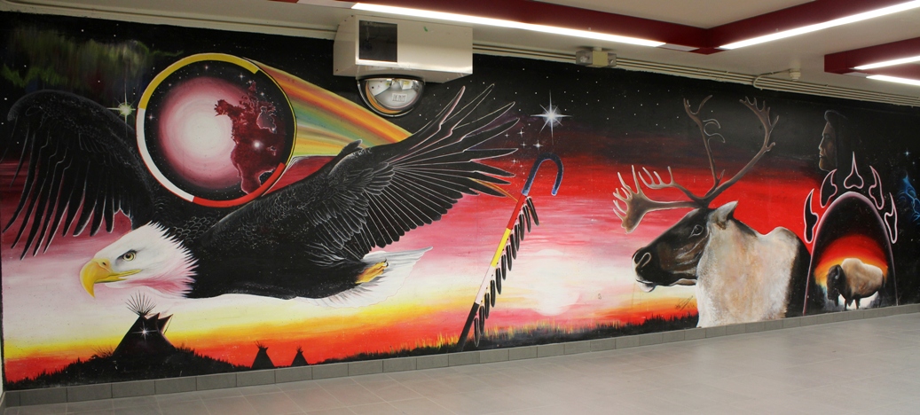 Mural of Indigenous culture, featuring an eagle and caribou