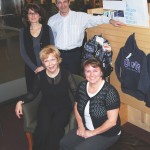 Pat Reid with her team, clockwise from left: Leta Beyak, assistant director, ancillary services, Murray Elfenbaum, administrative coordinator, Julia Panchyshyn, admin. assistant for the U of M Bookstore.