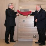 President David Barnard (left) and Dean Norman Halden unveil a plaque honouring Dr. Klaus 