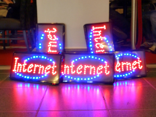 neon internet signs on the floor if a shopping mall