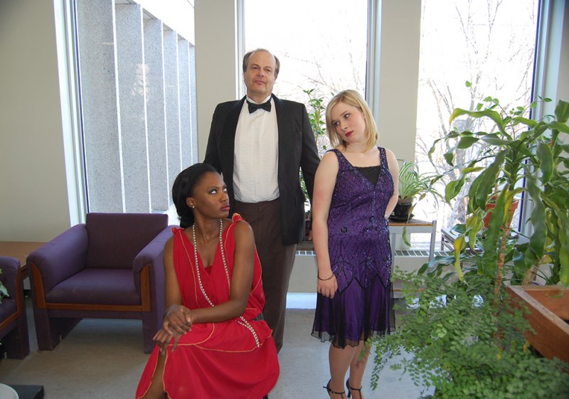 Lulu Akhanamoya as Judith Bliss, with Don Wallace as David Bliss and Kristen Einarson as Myra Arundel.
