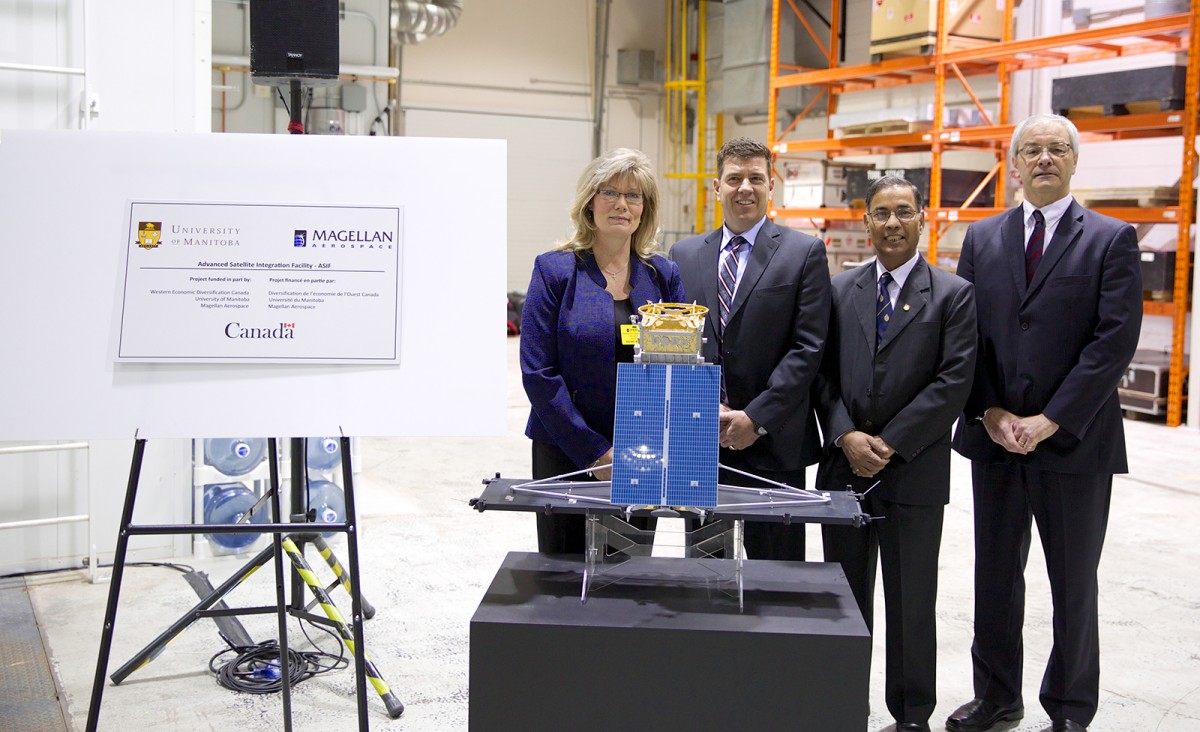 From left to right: The Honourable Shelly Glover, Minister of Canadian Heritage and Official Languages, MP for Saint Boniface; Don Boitson (BSc(ME)/86) VP and General Manager, Magellan Aerospace Winnipeg; Dr. Digvir Jayas, VP (Research and International), U of M; Dr. Jonathan Beddoes, Dean of Engineering, U of M.