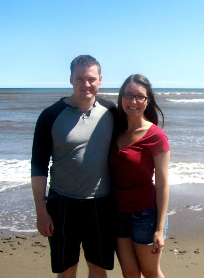Rebecca and her husband Tyler on the beach in Halifax. 