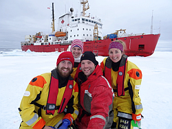 On-ice selfie taken during one of the tower deployments. Left to right: Callum Mireault (ArcticNet), Nathalie Thériault (CEOS), Hugo Jacques (CCGS) and Lauren Candlish (CEOS) // Photo: Hugo Jacques.