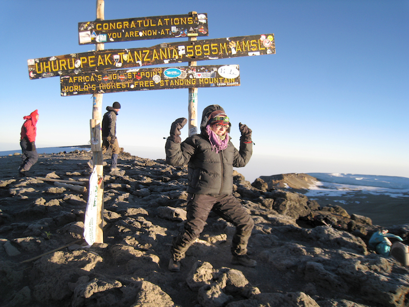 Amy Dytnerski on the summit of Mount Kilimanjaro