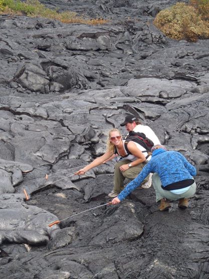 Rankine and colleagues cook hot dogs over a lava flow in Hawaii while doing field work. // Submitted photo