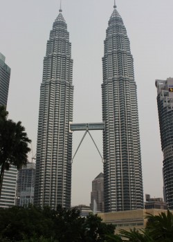 A view of the Petronas Towers from the ground level in downtown Kuala Lumpur