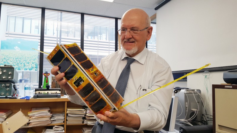 Professor Witold Kinsner is still proud of the first version of UMSATS' satellite, which was crammed with high technology and even some low technology, like using a slice of tape measure metal for the antenna -- it's light, flexible, and works. 