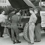 U of M Canadian Officer Training Corp members and a jeep on campus // Photo courtesy of UM Digital Collections
