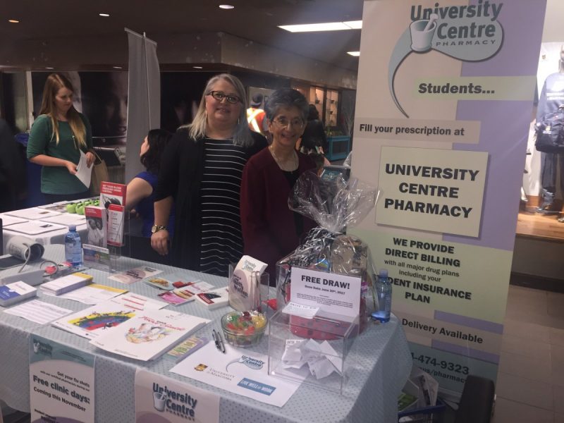 Donna Rutkowski and Meera Thadani of the University Centre Pharmacy at their booth in University Centre