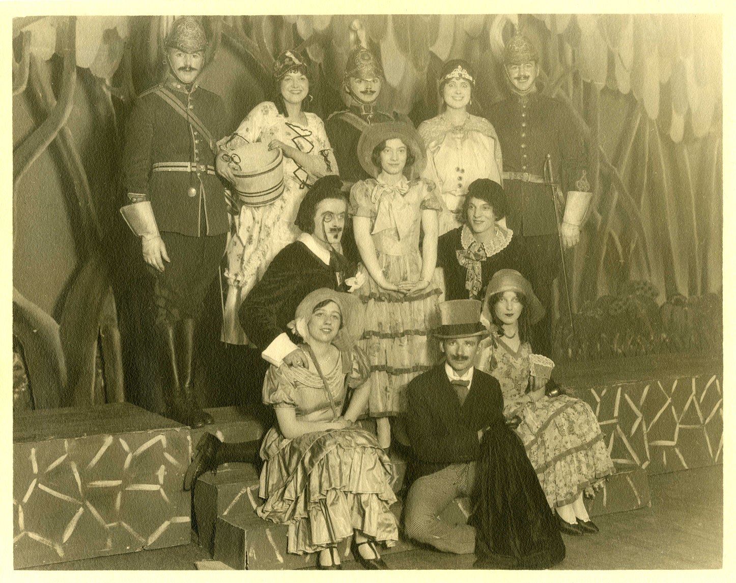 A photograph of the principal actors from the University of Manitoba theatre production of 'Patience' in 1930. Eleven unidentified actors are visible, in costume.<br />
Source: University Relations & Information Office fonds