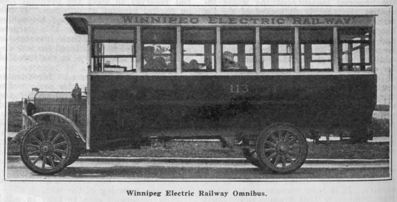 a black and white image of an eectric bus