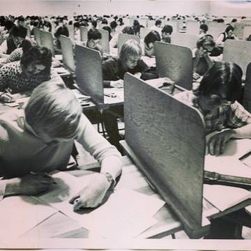 Students writing exams.<br />
Source: University of Manitoba Archives & Special Collections