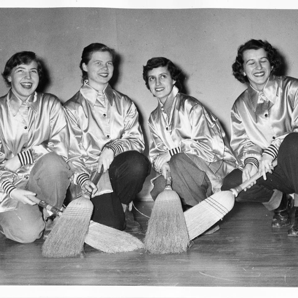 Women's Intercollegiate curling team, 1955: Holly Kent (Lead), Mary Jane Rasmussen (Second), Shirley Wilkie (Third), and Marilyn Davis (Skip)<br />
Source: Faculty of Physical Education and Recreation fonds.