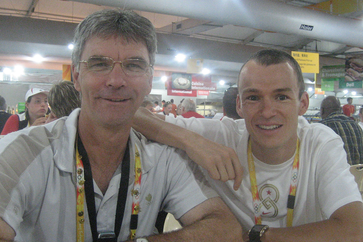 Bergeron hanging out with Canadian triathlete Simon Witfield in the athletes’ village cafeteria in Beijing.