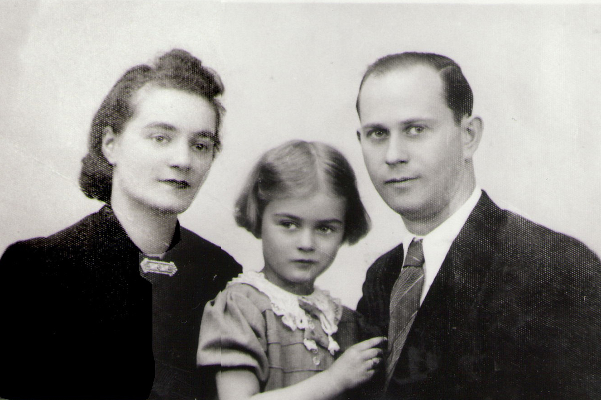 Susan Garfield (centre) with her parents before the war. // Photo courtesy Belle Jarniewski, Voices of Winnipeg Holocaust Survivors
