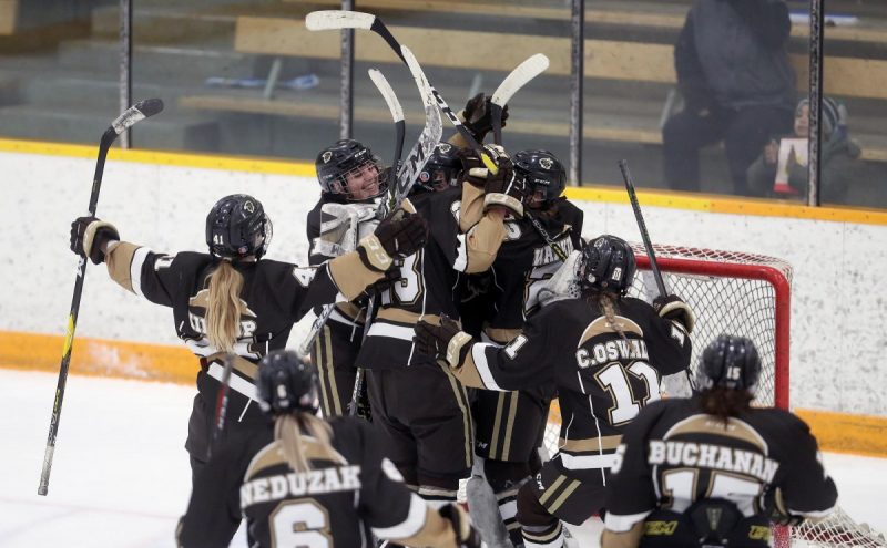 Bison women's hockey team celebrates win over UBC.//Photo: Trevor Hagan