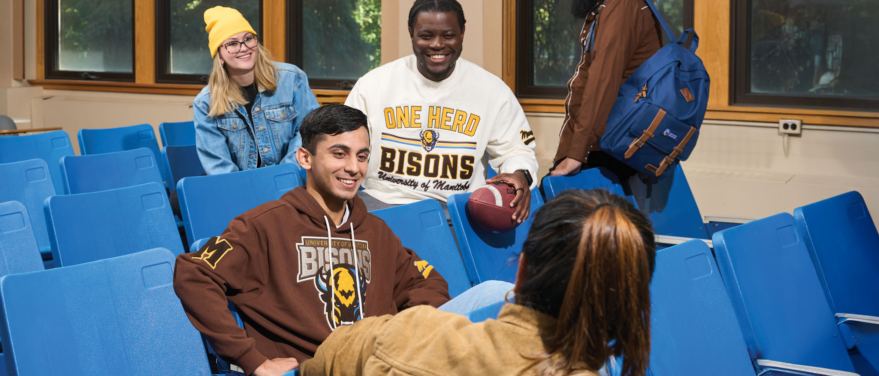 UM students wearing the UM-Mondetta collection in a classroom. 