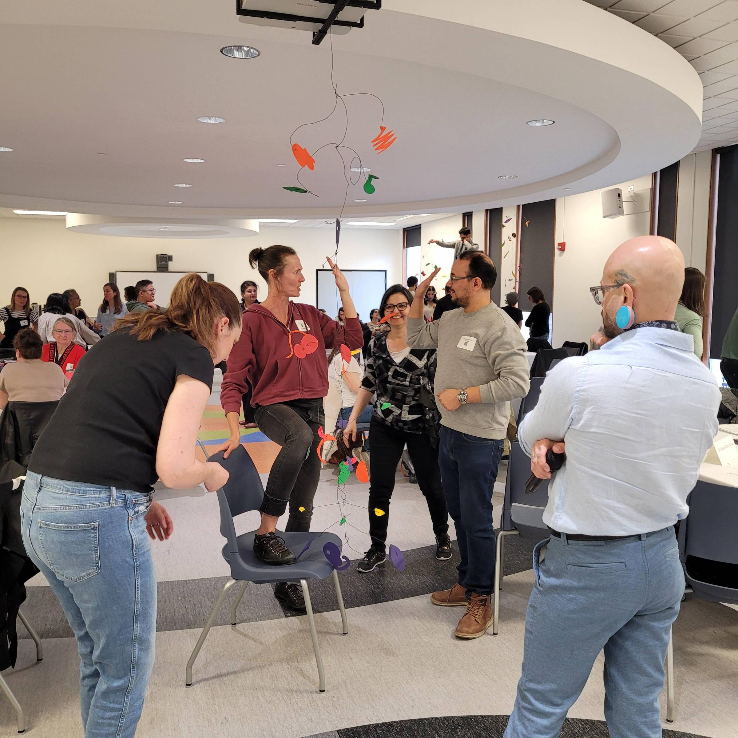 Participants interacting in a teaching exercise.