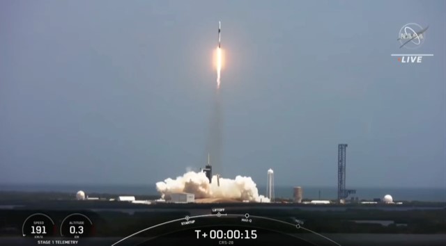 A rocket shooting into the sky just after launch.