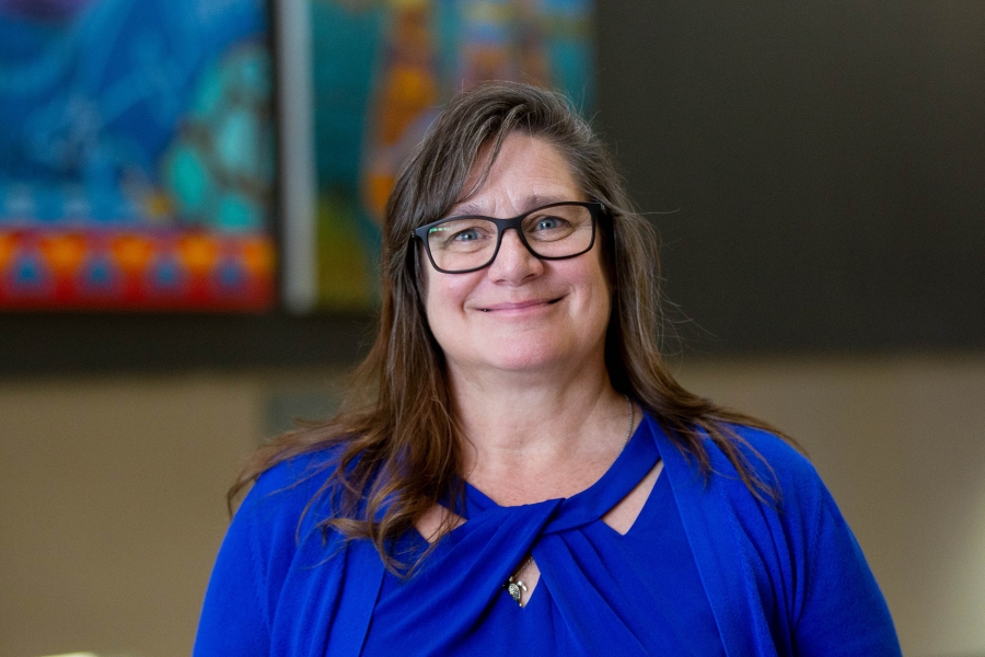 Jackie Elliot smiles in a head shot