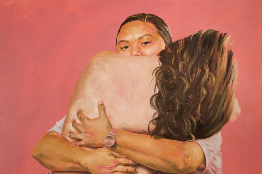 A painting called "Embrace" by Laura Lewis. Two people embrace on a pink background.