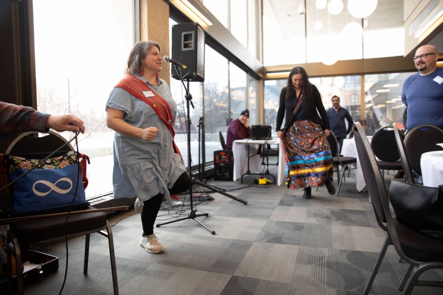 People jigging at UM Louis Riel Day Celebration.