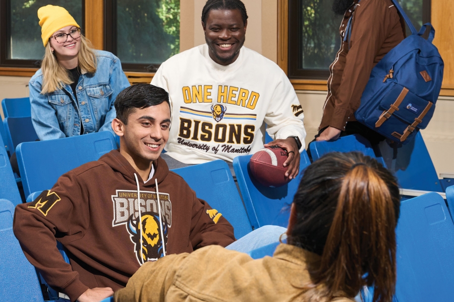 UM students wearing the UM-Mondetta collection in a classroom. 