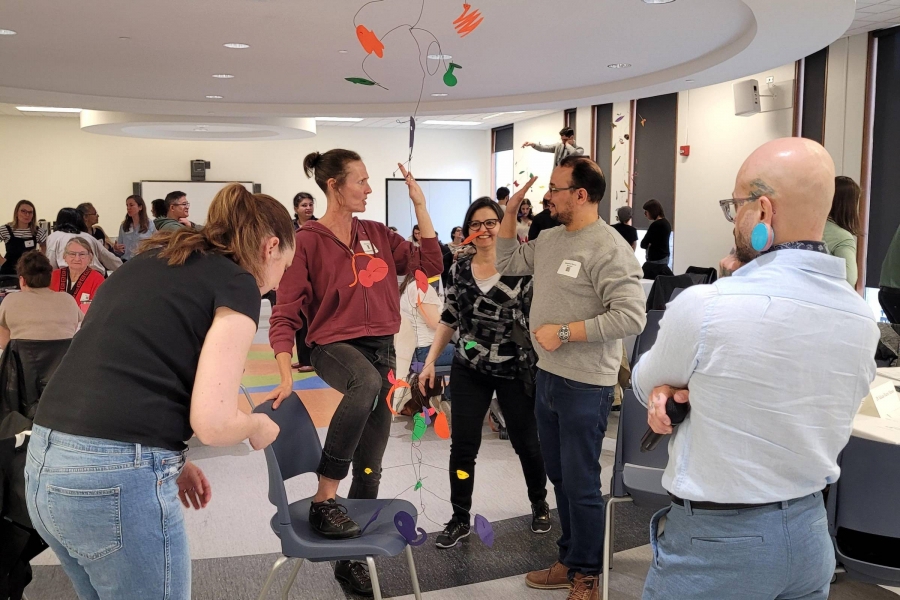 Participants interacting in a teaching exercise.