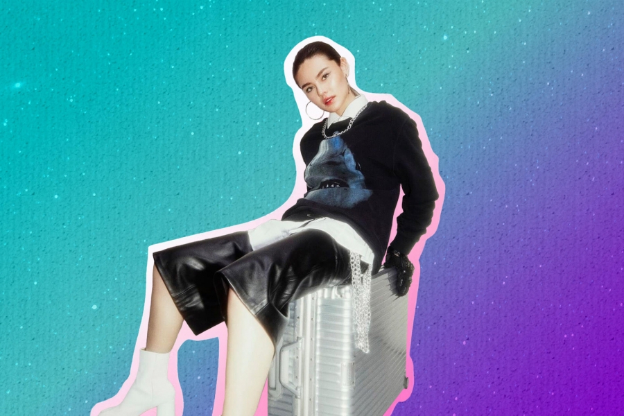 Willow reclines in a photograph in a collage-esque image.