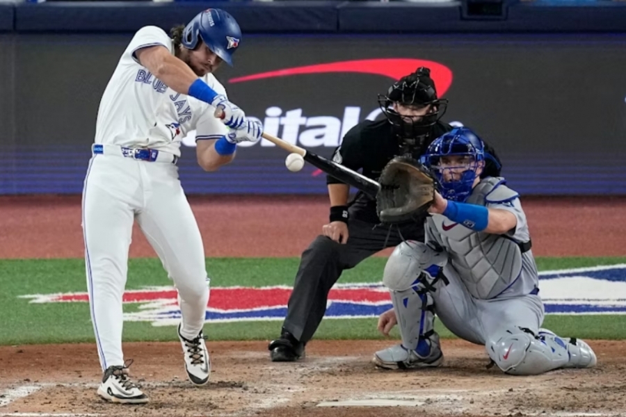 Blue Jays player hitting the ball