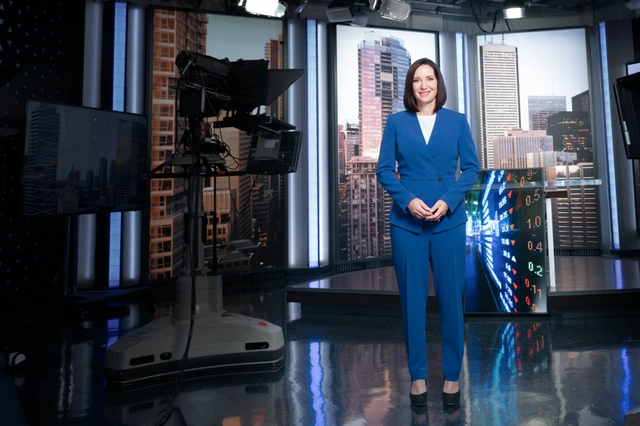 Amanda Lang standing in a broadcast studio