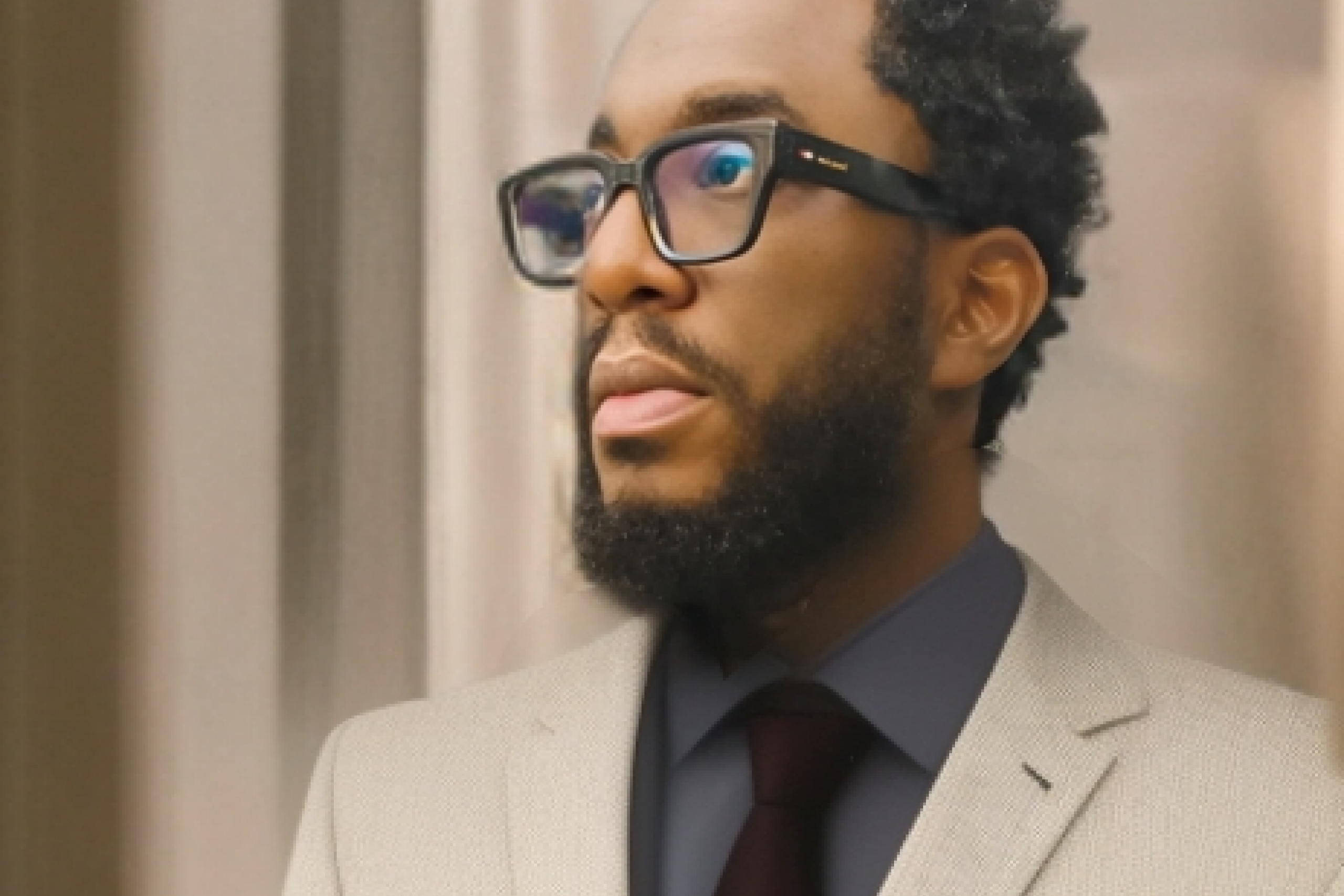 man in jacket and tie