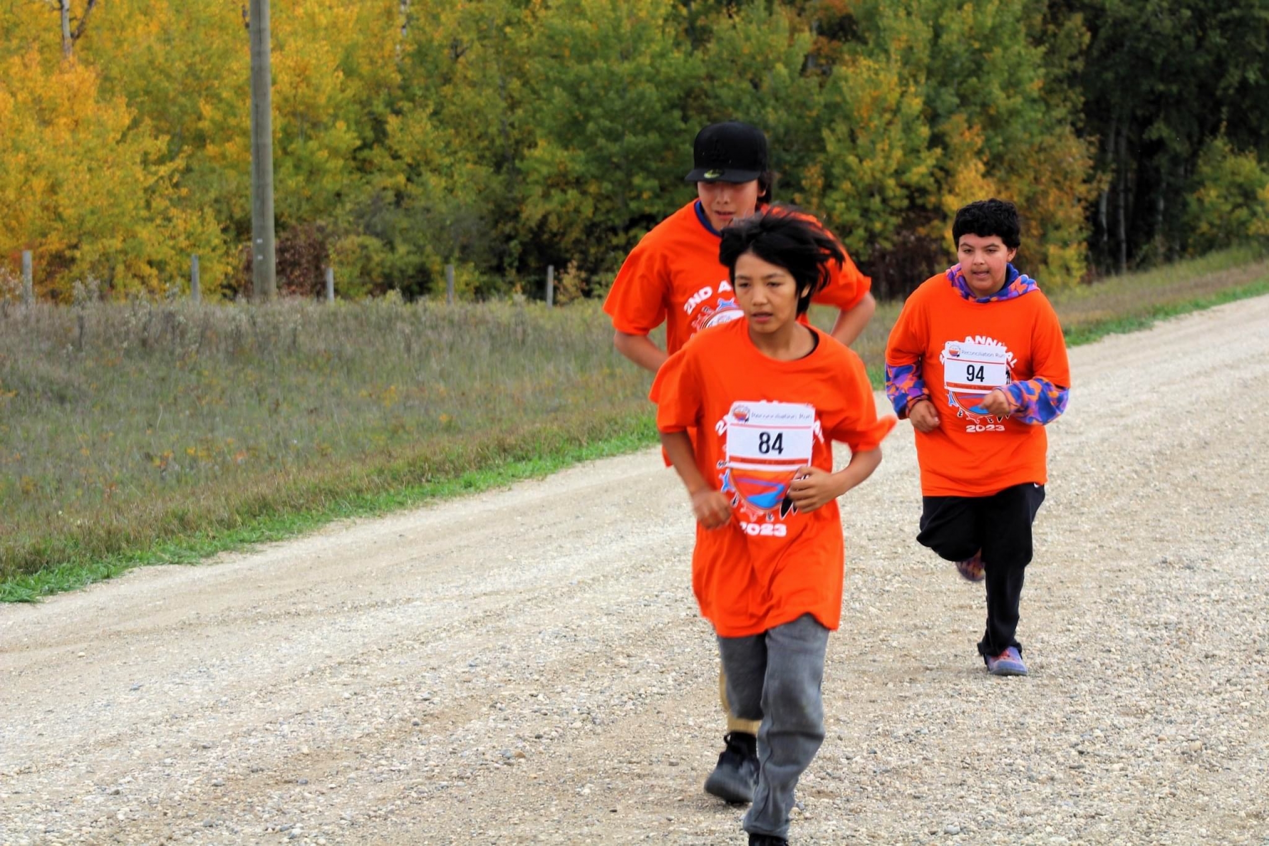 Birdtail Sioux Youth Running on the road during the Reconciliation Run