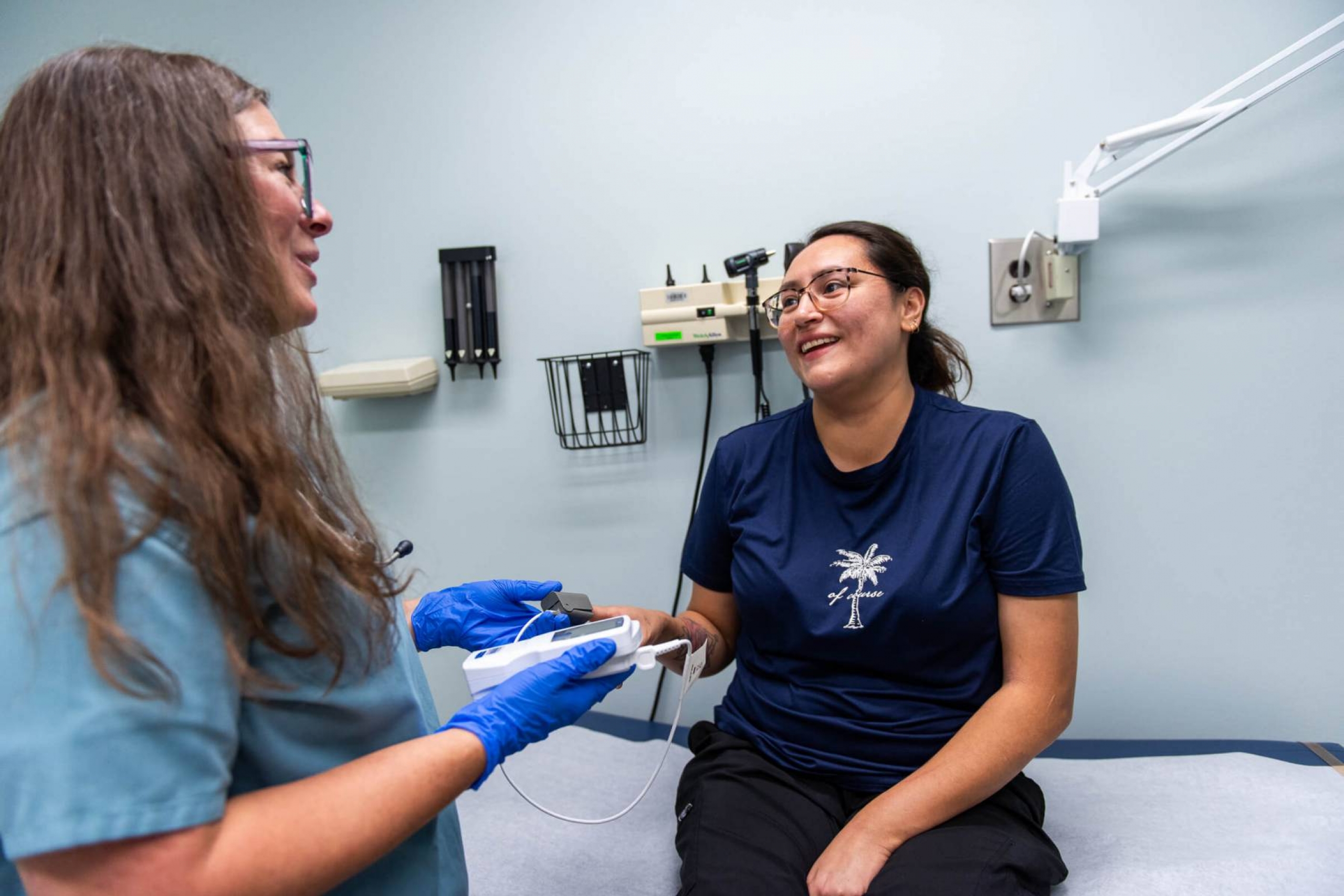A doctor treats a patient.