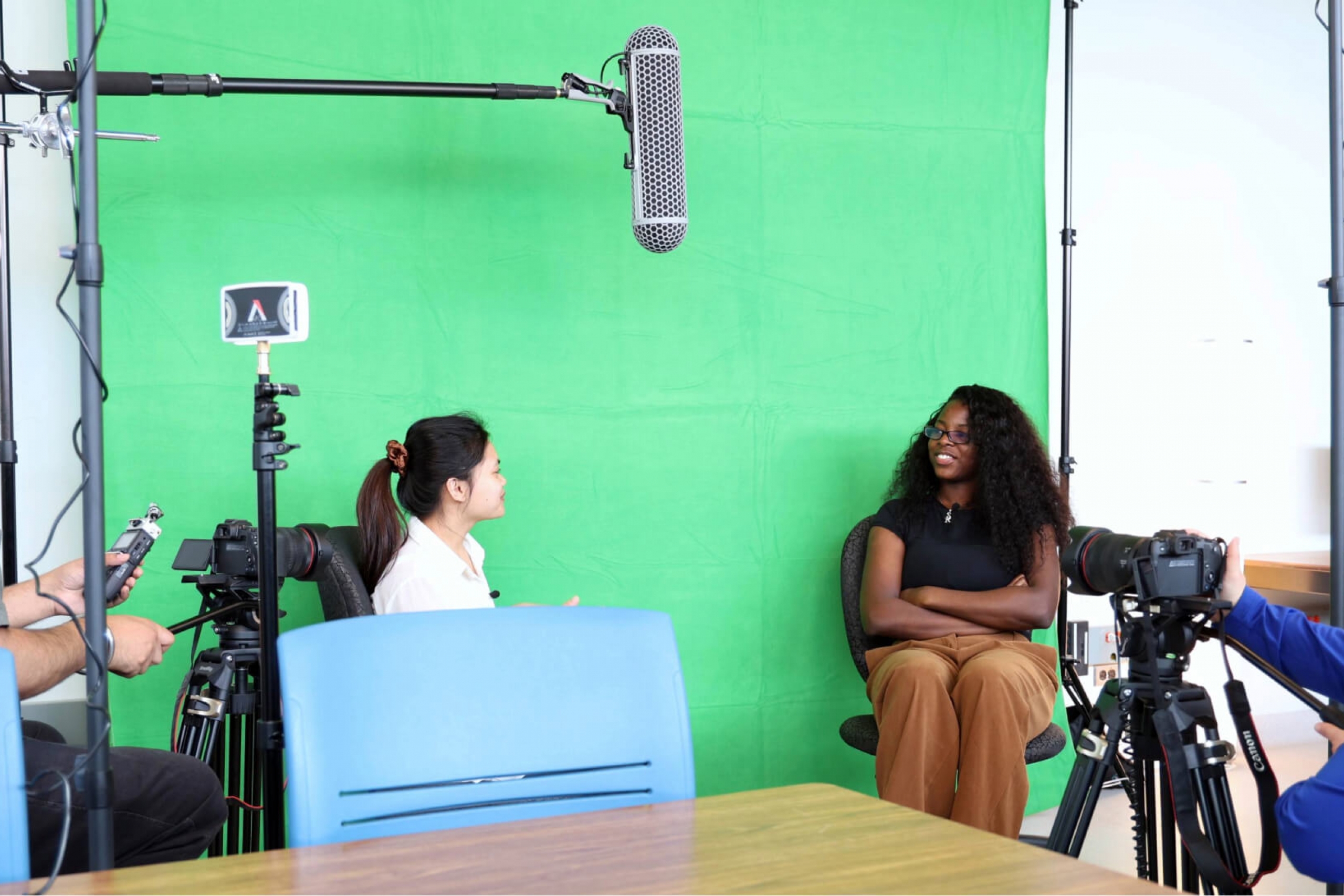 Students and staff film a video in the new Digital Literacies Lab in the Faculty of Education.