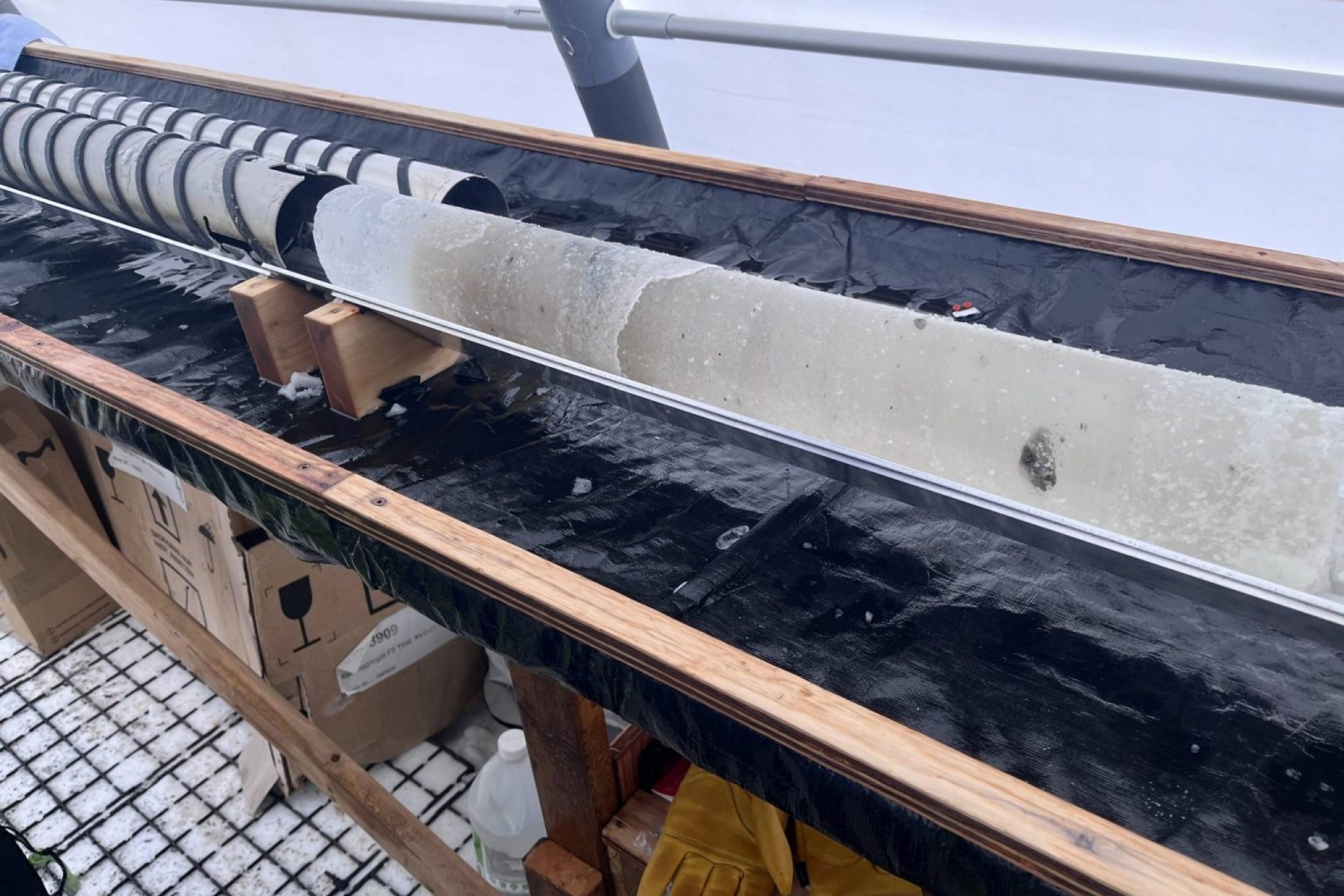 an ice core showing layers of sediment 