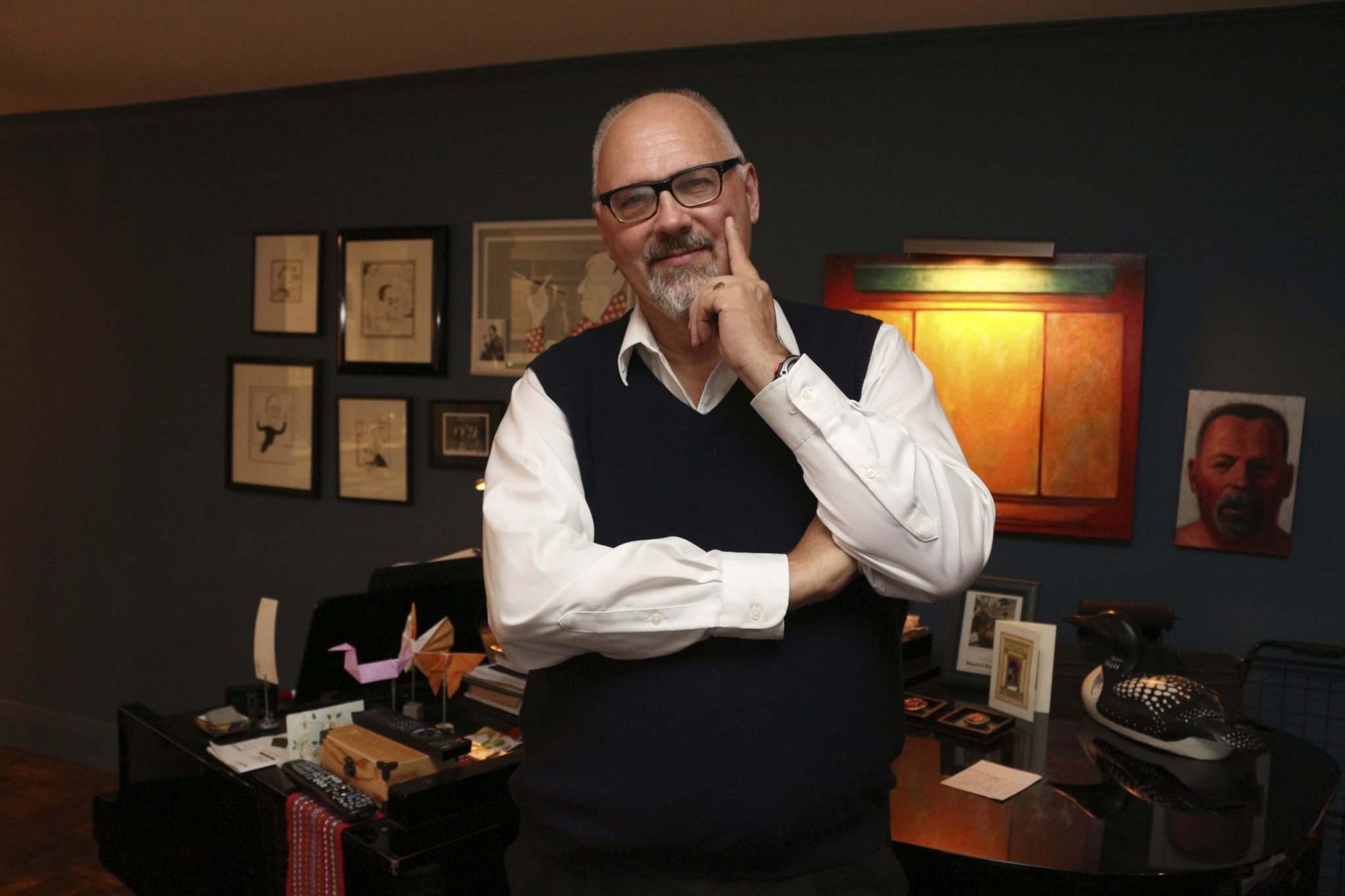 John Greer standing in his home office