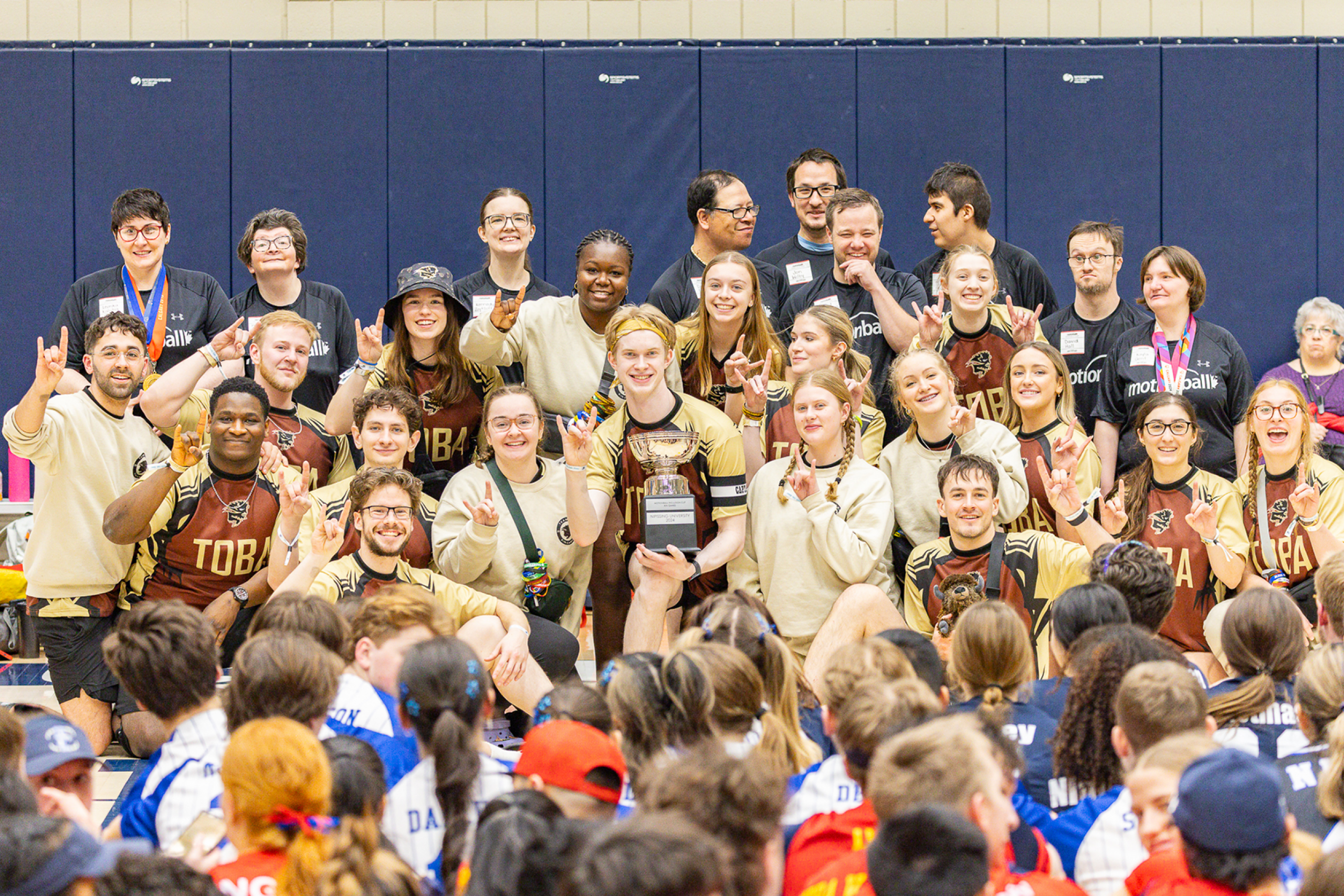 A large group of students pose at the 2025 kin games.