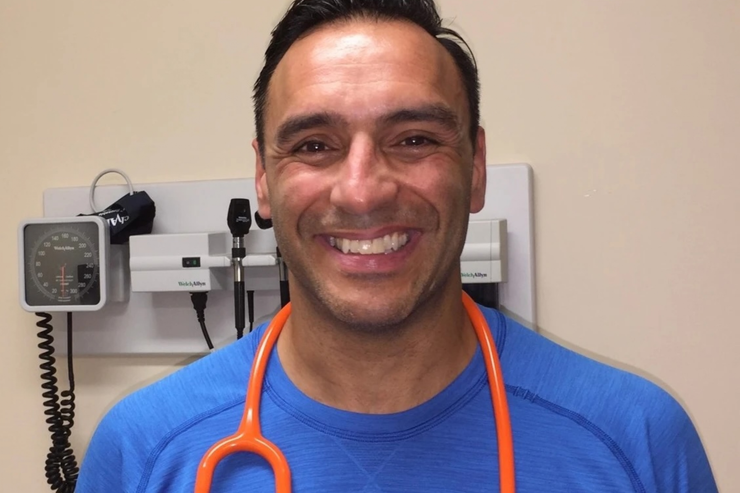 Allen Jones in scrubs.