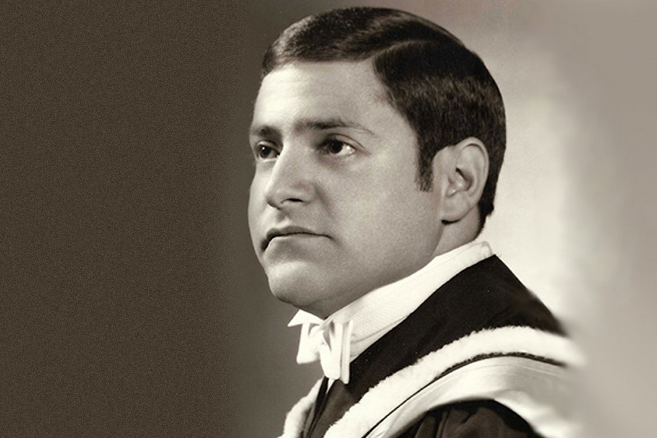 Butch Nepon in his university graduation photo.