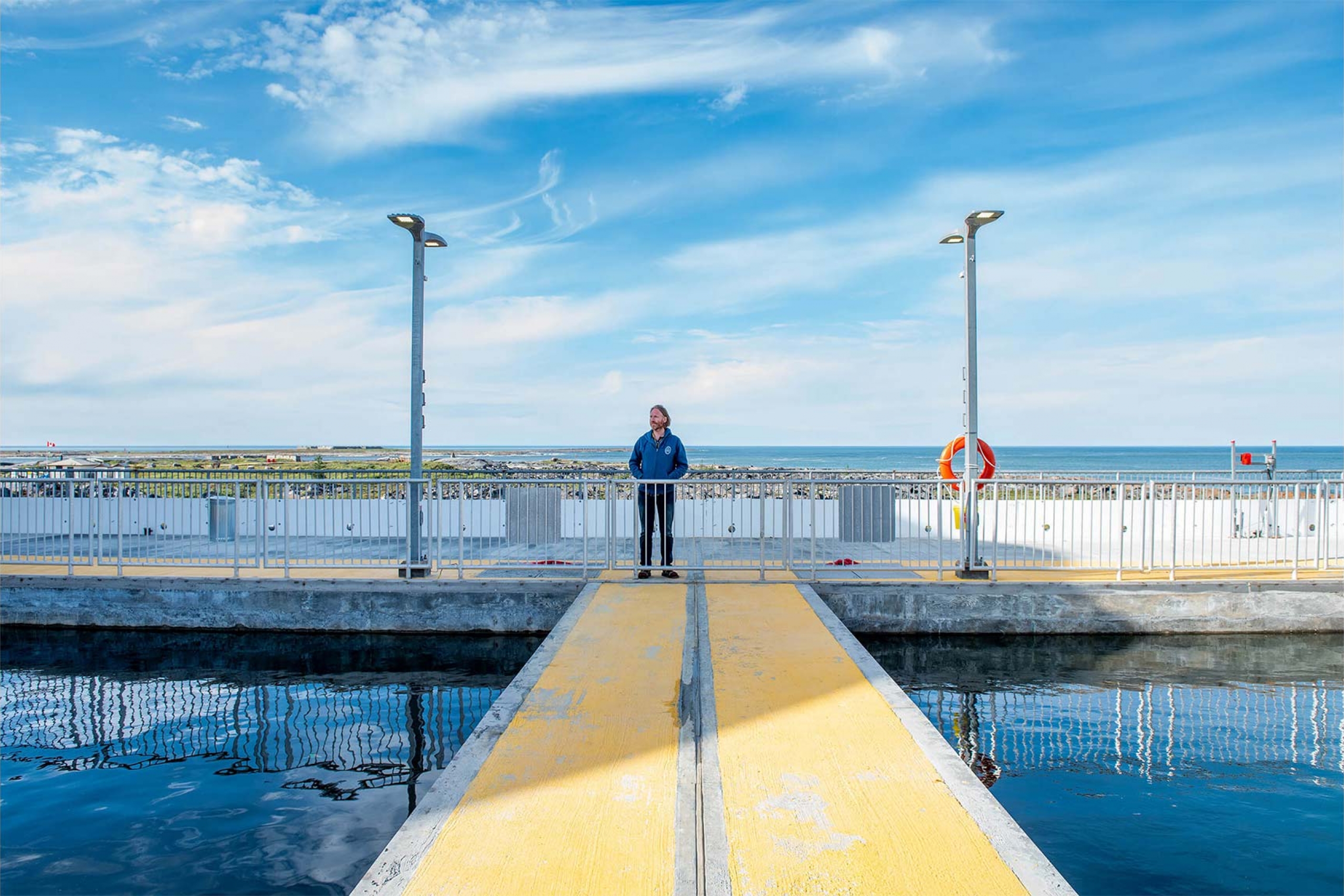 Researcher Eric Collins stands on the deck of the Churchill Marine Observatory