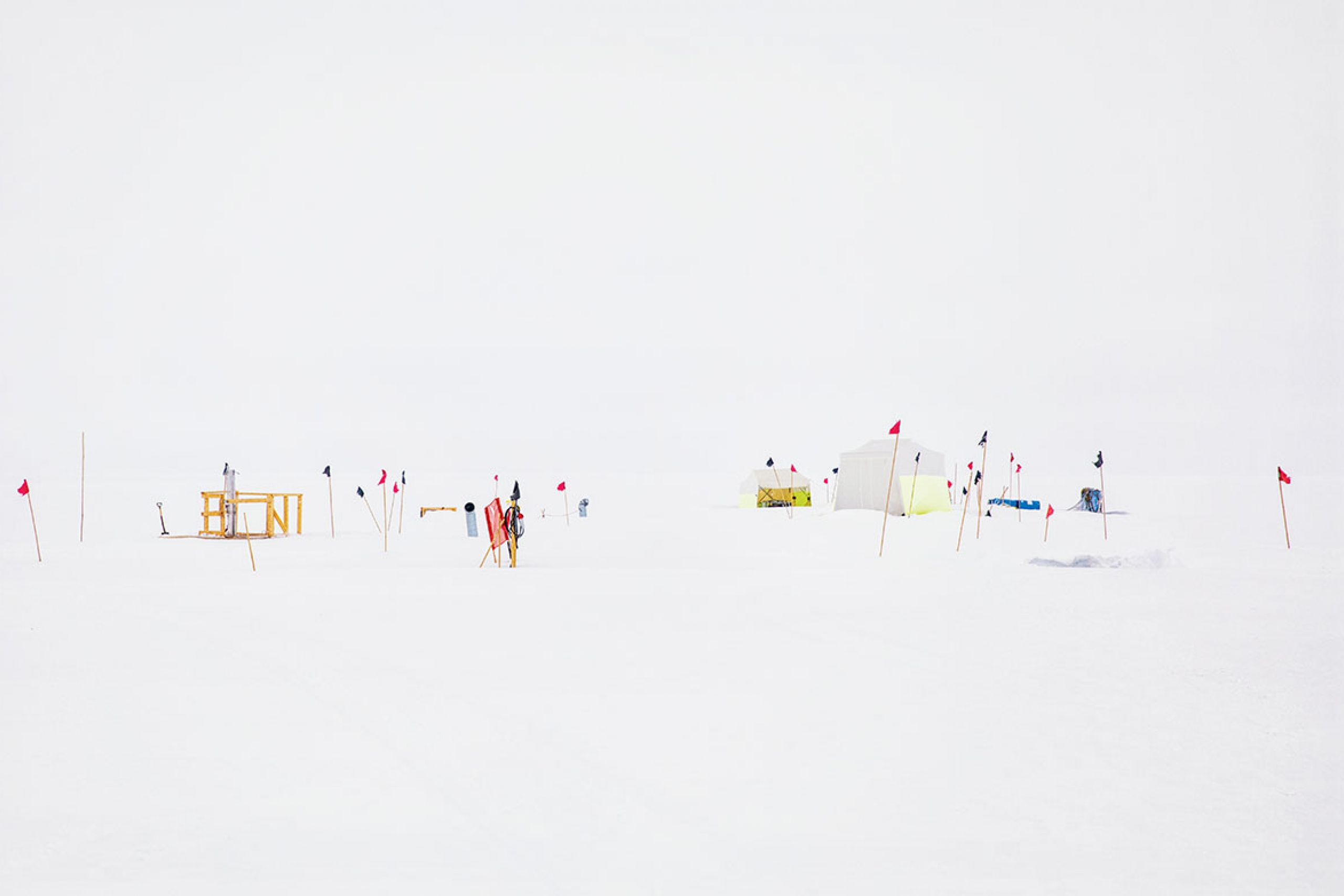 Flags marking camp boundaries on the Greenland ice sheet