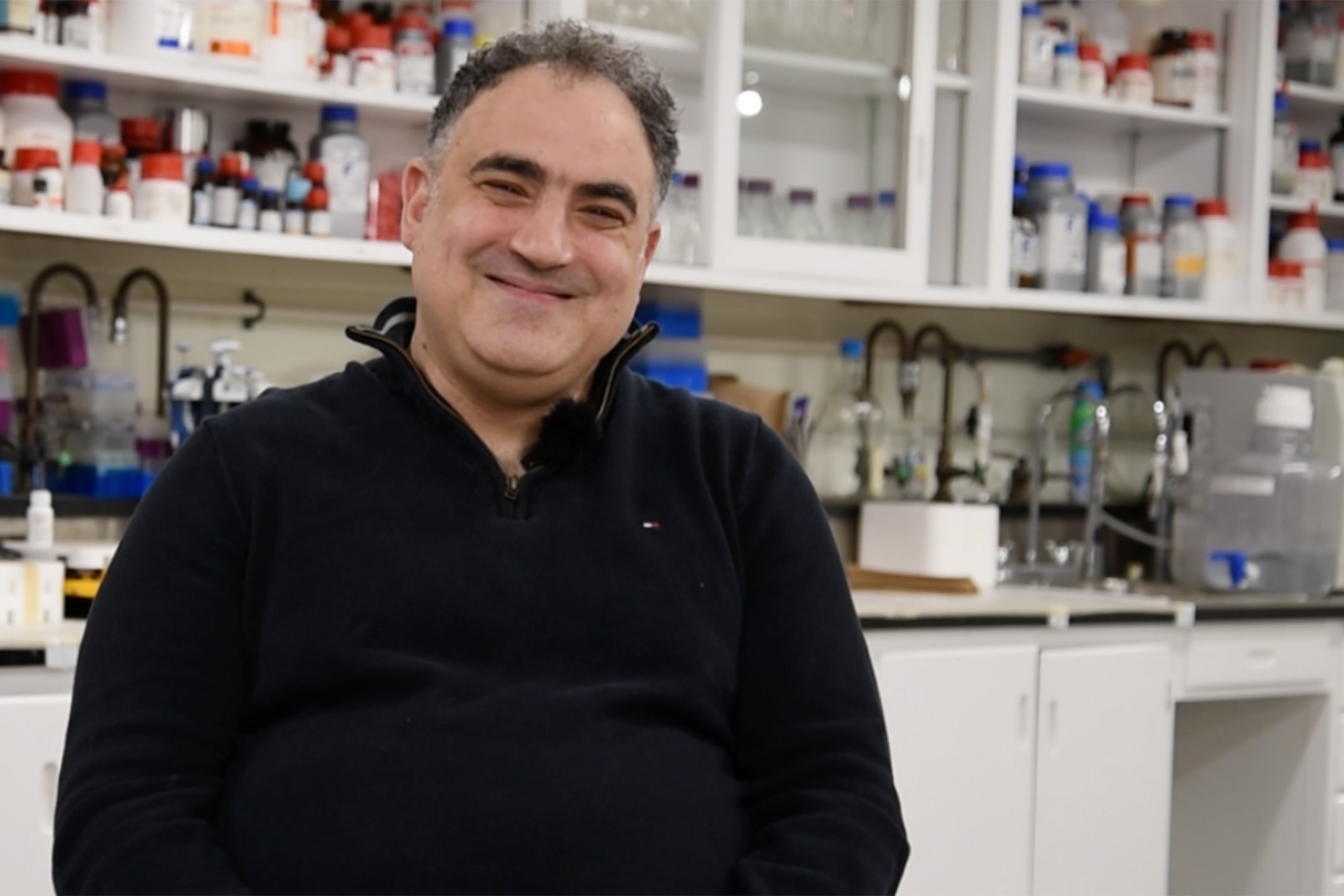 Mazdak Khajehpour smiling at the camera.