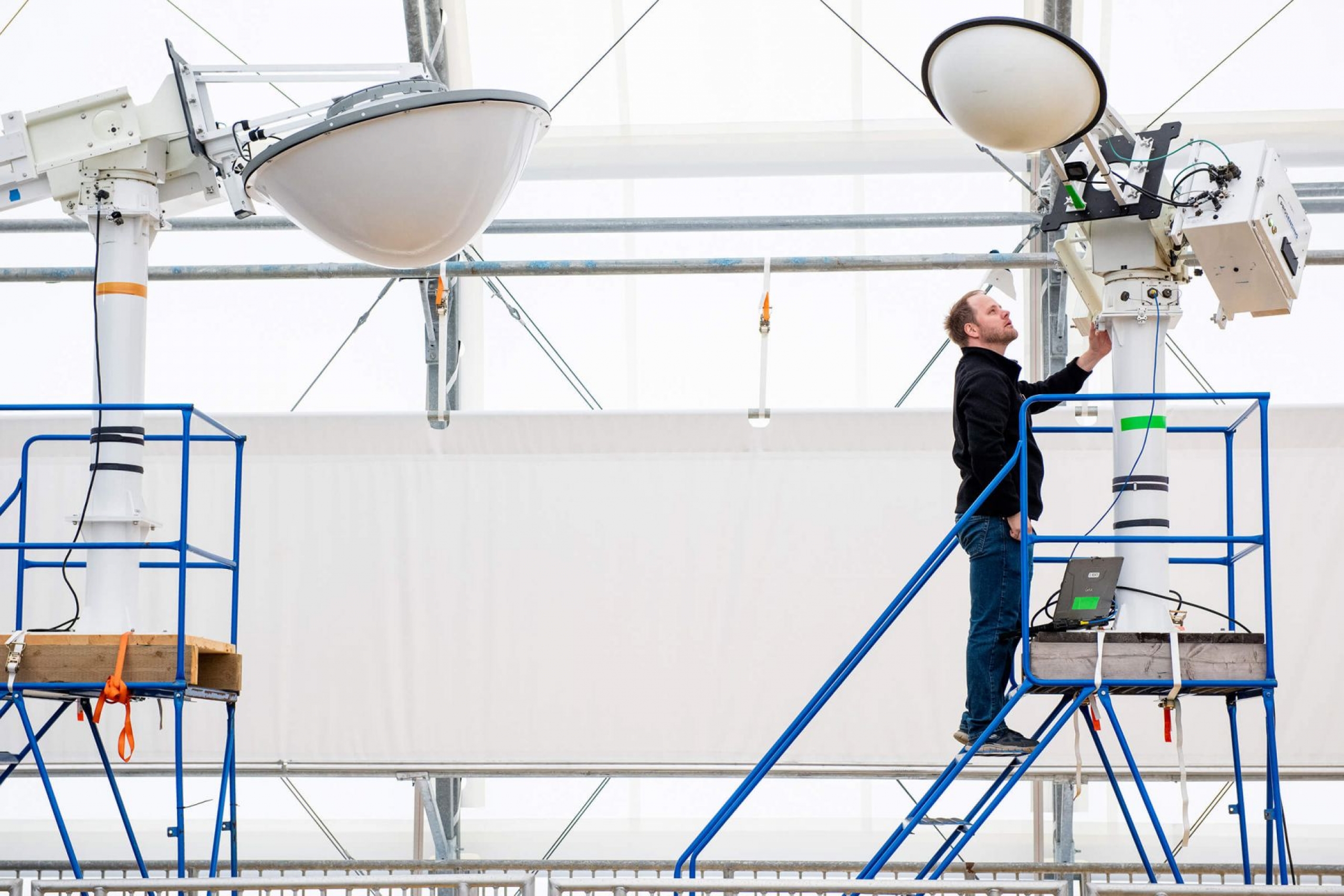 Dustin Isleifson, Director of the Centre for Earth Observation Science, monitors the radars that scan the water