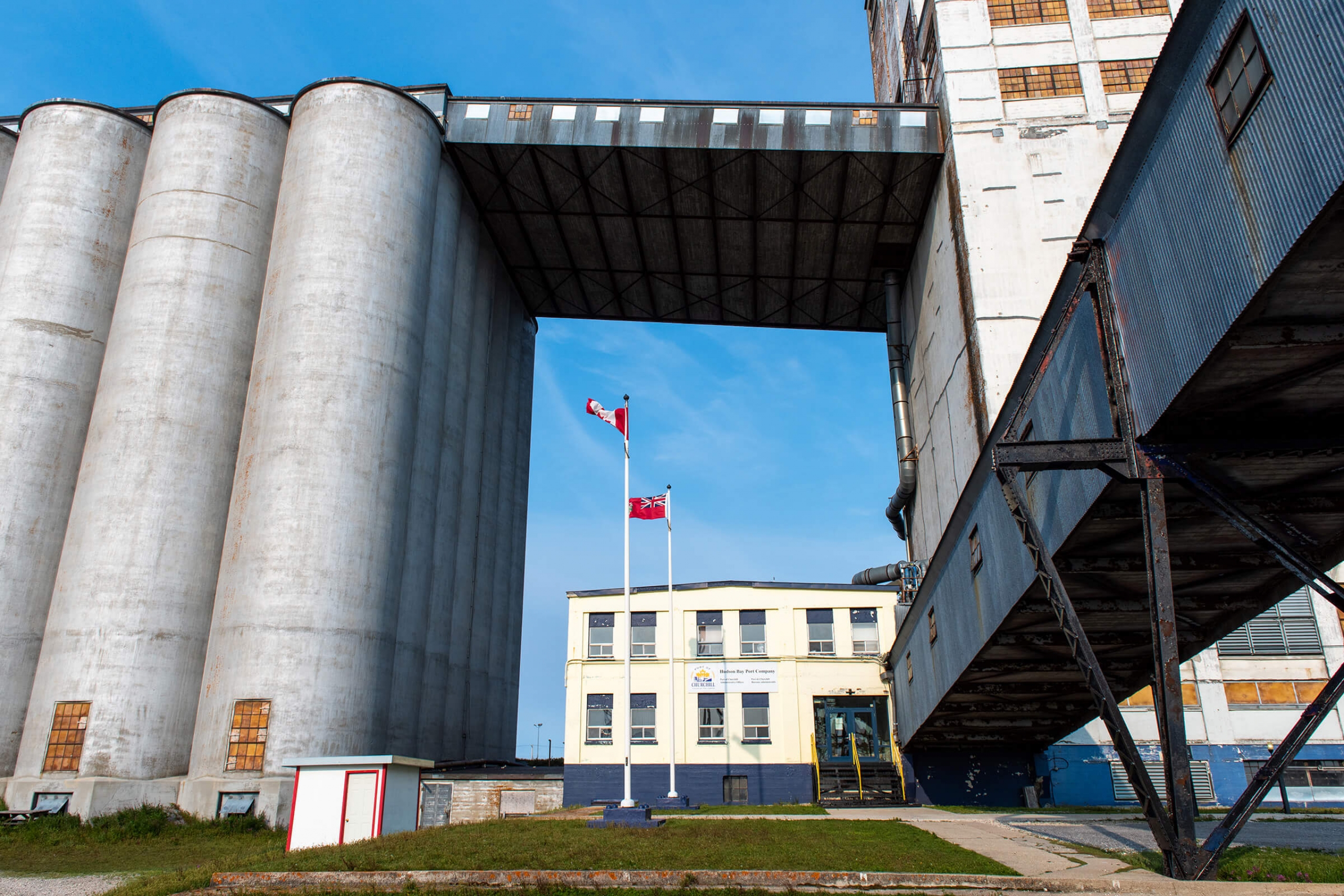Exterior of the port buildings showing the flags of Canada and Manitoba