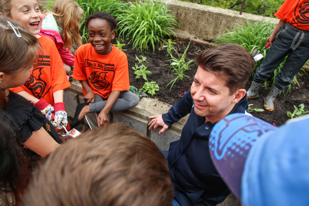 Vice-President (External) John Kearsey (right) on Campus Beautification Day, May 27, 2016 with students from École St. Avila. // Photo by Mike Latschislaw