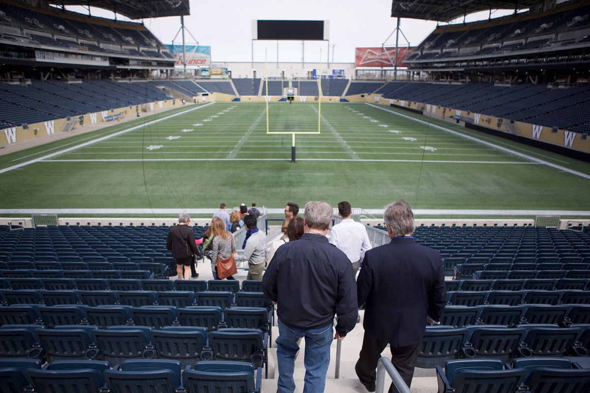 Participants in the 2016 Jane’s Walk check out Investors Group Field. The event ran on May 6 and May 7.