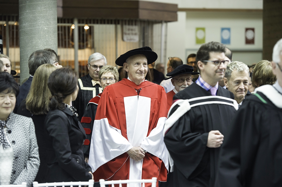 Ernest Rady enters the Convocation. // Photo by David Lipnowski
